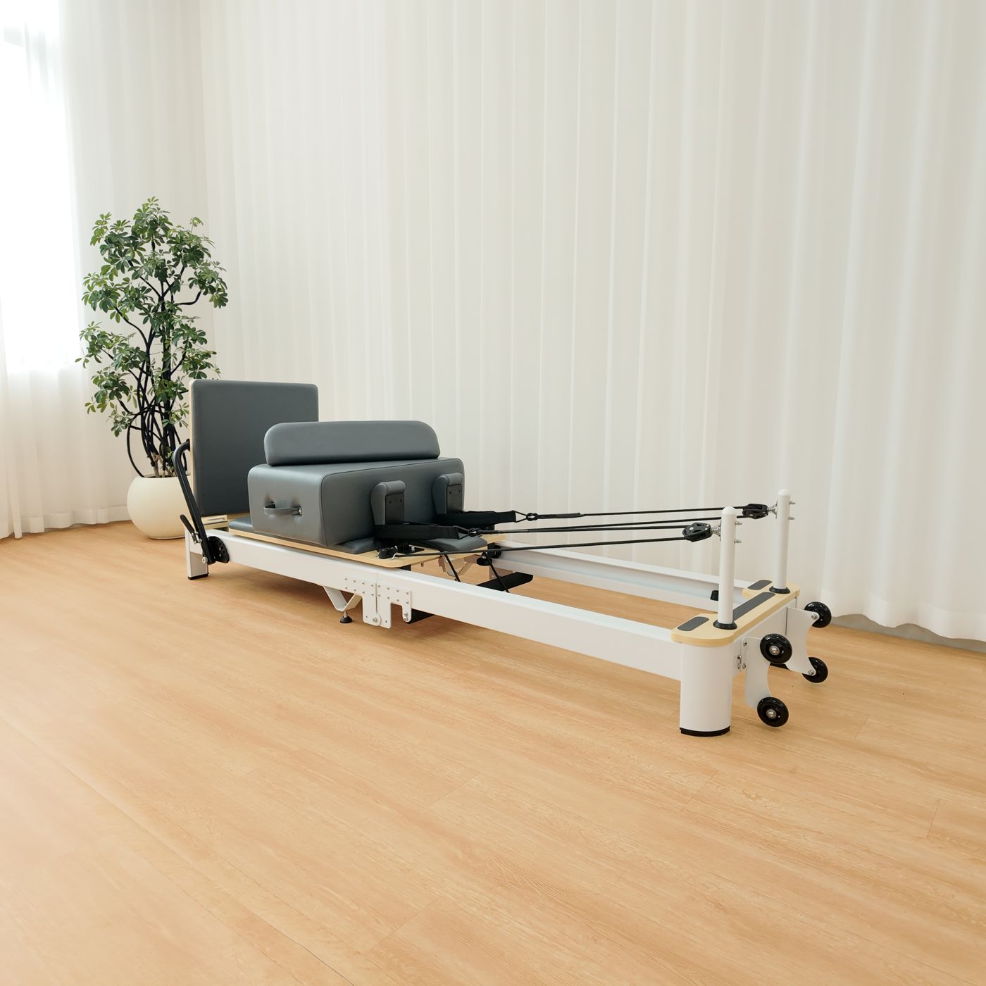The reformer unfolded, three-quarter view from the head end.